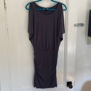 Grey layered knee-length dress with rouching details.